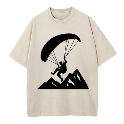 Paraglider soaring over mountain peaks - Vintage T-shirt - Off White