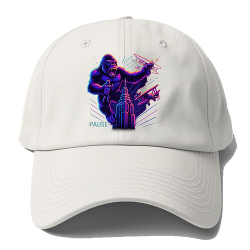 giant gorilla on top of skyscraper holding small figure, swatting planes - Baseball Cap