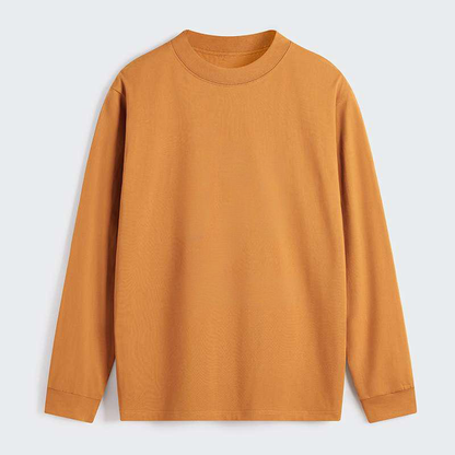 Mustard yellow long-sleeve shirt on a light gray background
