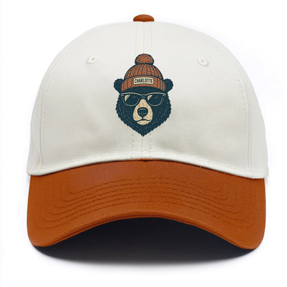 North Carolina Black Bear wearing Charlotte beanie with pom pom and wayfarer - Two Tone Cap - Orange