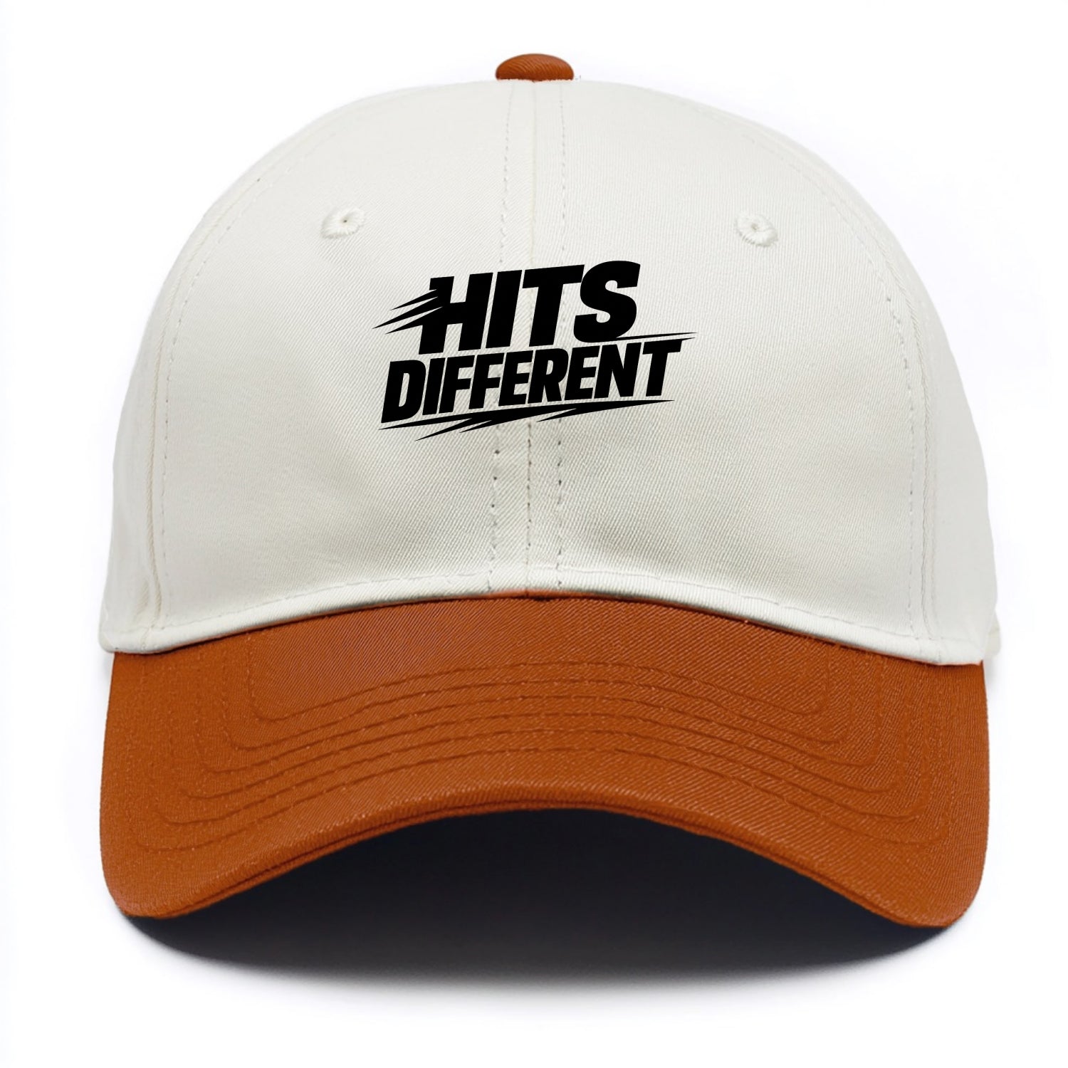Bold typography design - "HITS DIFFERENT" - uniquely special, stands out - Two Tone Cap - Orange