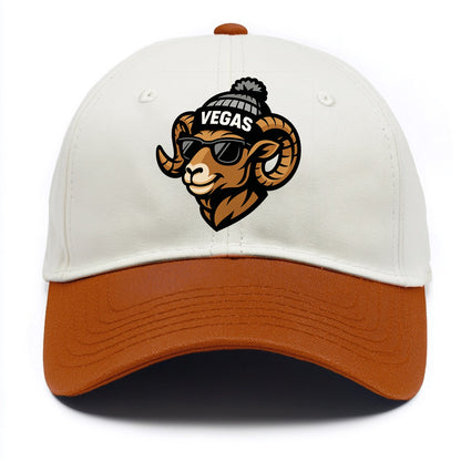 Vegas Desert Bighorn wearing Raiders silver and black beanie with pom pom and - Two Tone Cap - Orange