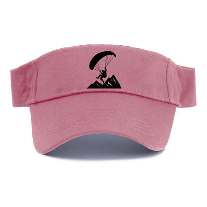 Paraglider soaring over mountain peaks - Visor - Pink