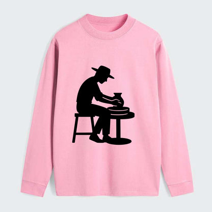 Potter shaping clay on wheel - Classic Long Sleeve Shirt - Pink