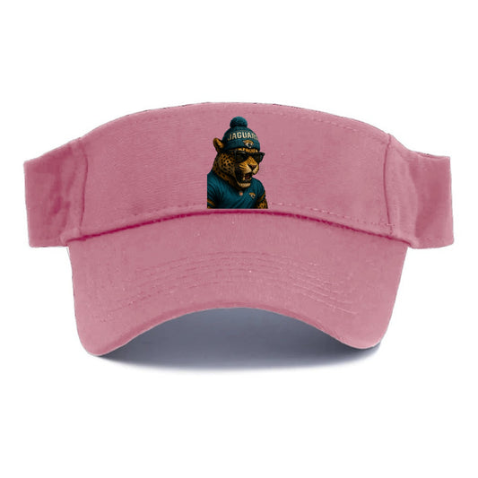 Jacksonville Jaguar wearing Jaguars teal and gold beanie with pom pom and wayfarer - Visor - Pink
