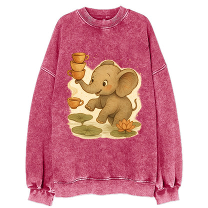 Elephant balancing teacups during a floating tea ceremony beside lotus ponds - Vintage Sweatshirt - Pink