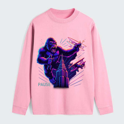 giant gorilla on top of skyscraper holding small figure, swatting planes - Classic Long Sleeve Shirt - Pink