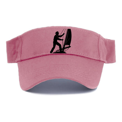 Sailor adjusting the boom on a sailboat - Visor - Pink