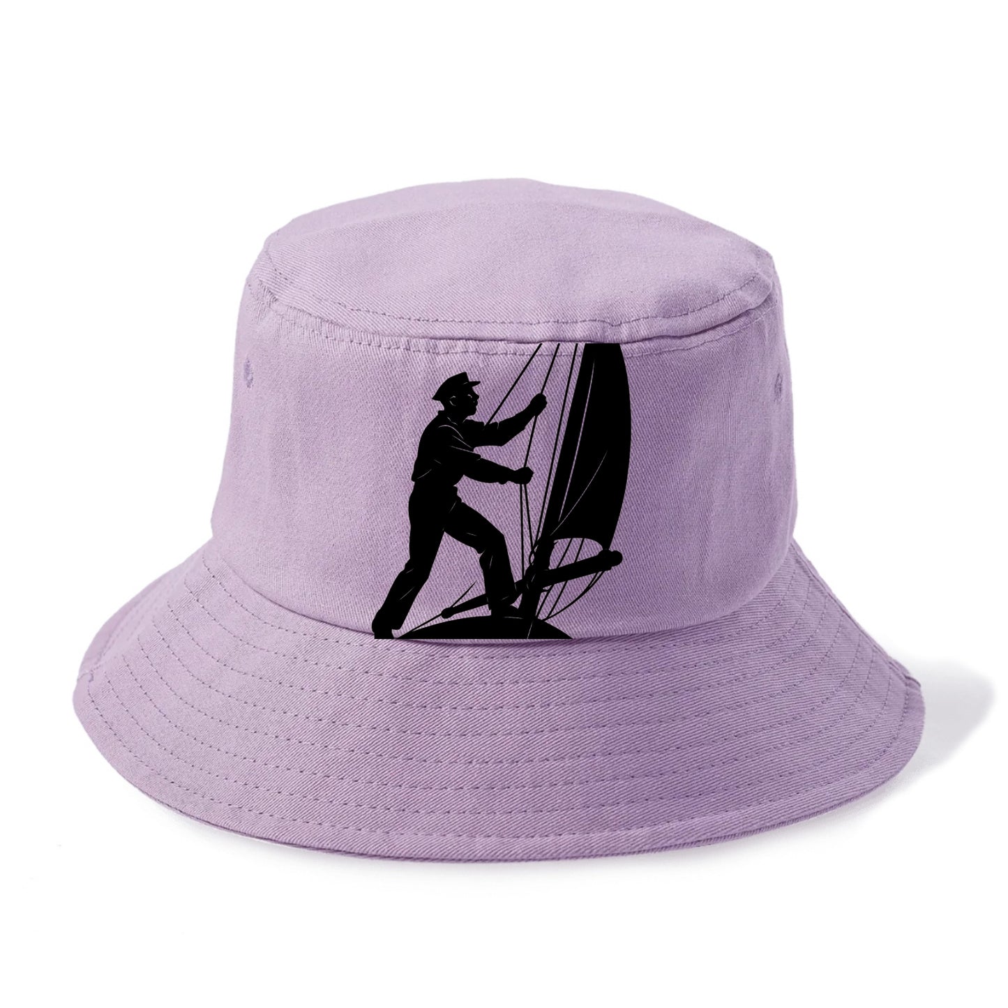 Sailor adjusting the boom on a sailboat - Bucket Hat - Purple