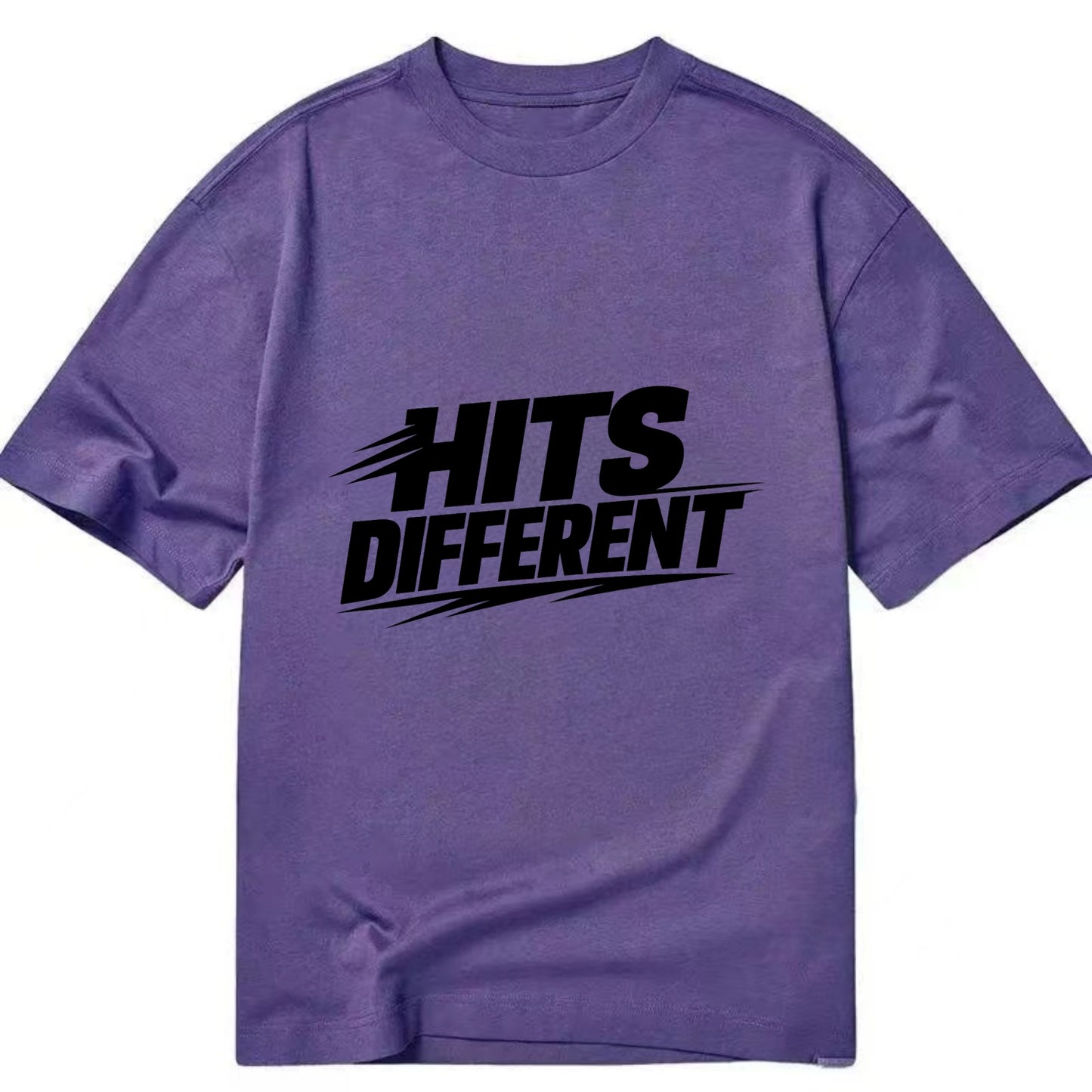 Bold typography design - "HITS DIFFERENT" - uniquely special, stands out - Classic T-shirt - Purple