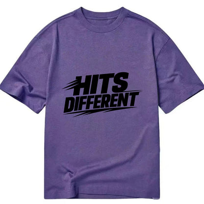 Bold typography design - "HITS DIFFERENT" - uniquely special, stands out - Classic T-shirt - Purple