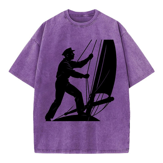 Sailor adjusting the boom on a sailboat - Vintage T-shirt - Purple