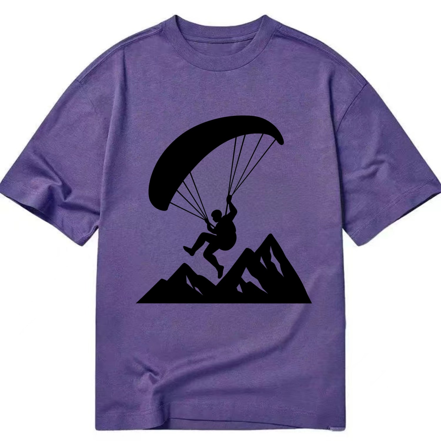 Paraglider soaring over mountain peaks - Classic T-shirt - Purple