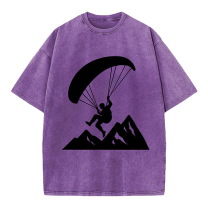 Paraglider soaring over mountain peaks - Vintage T-shirt - Purple
