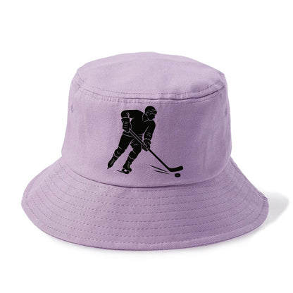 Ice hockey player shooting puck - Bucket Hat - Purple