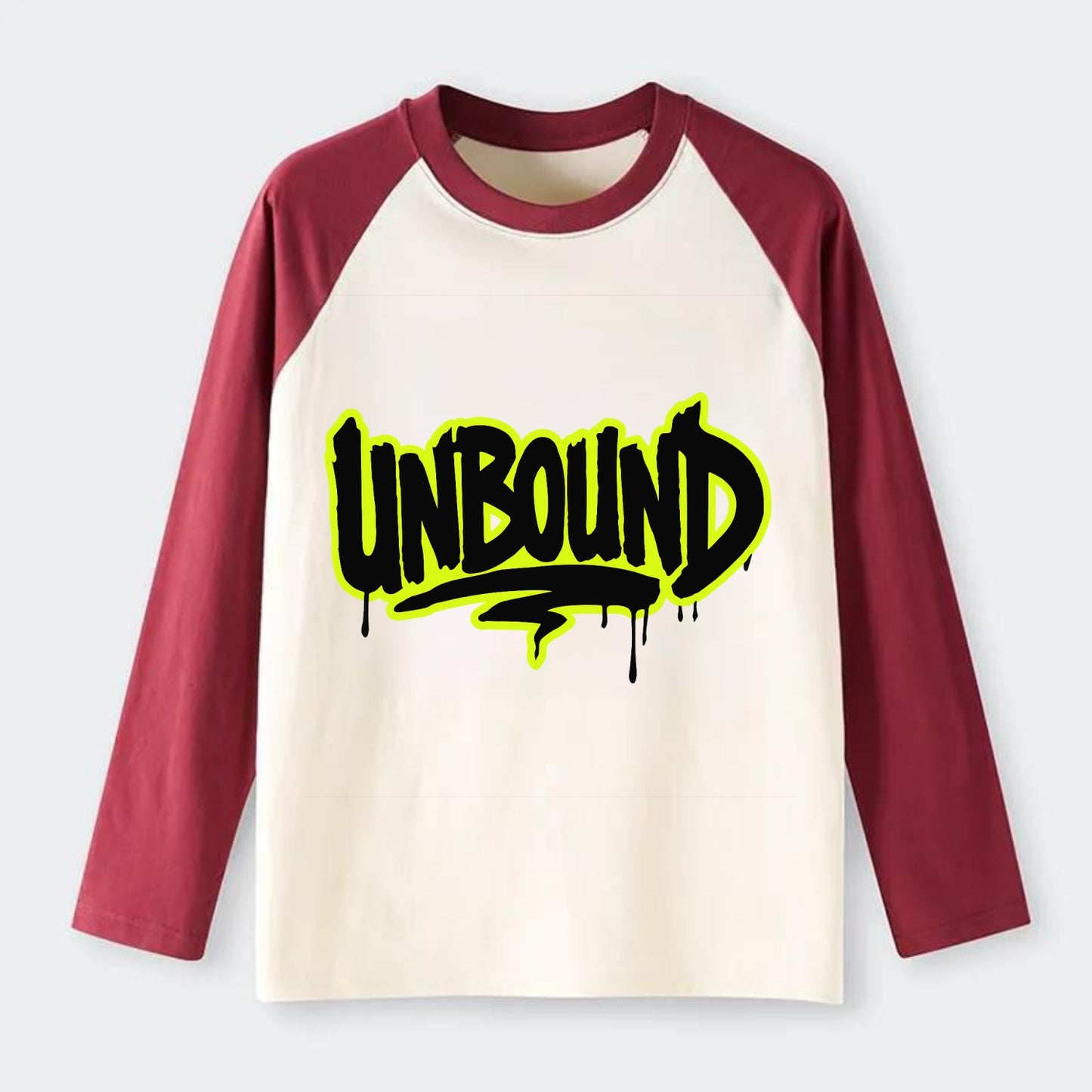 Bold typography design - "UNBOUND" - without limits, free from - Raglan Long Sleeve T-Shirt - Red