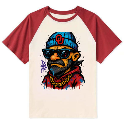 Norman Sooner wearing Oklahoma beanie with OU patch - Contrast Raglan T-shirt - Red
