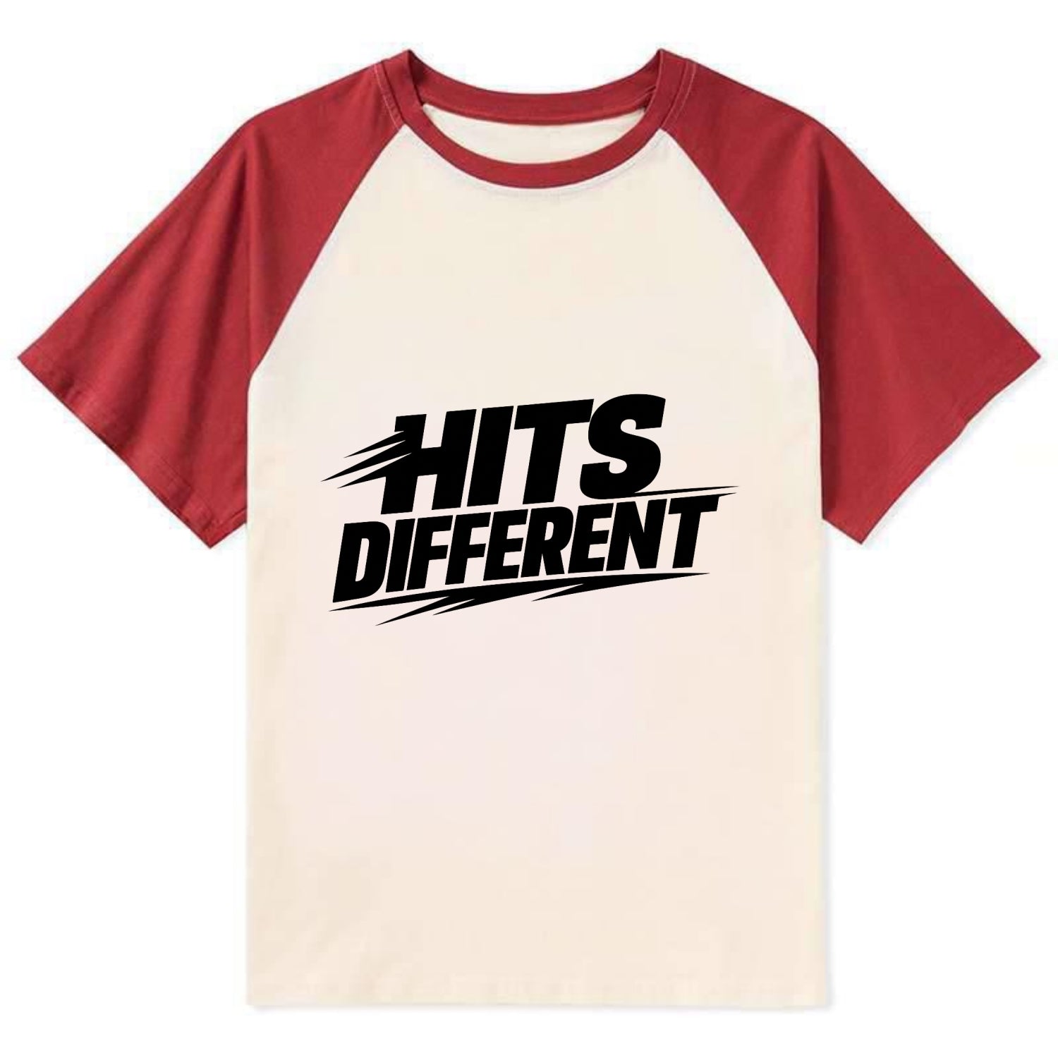Bold typography design - "HITS DIFFERENT" - uniquely special, stands out - Contrast Raglan T-shirt - Red