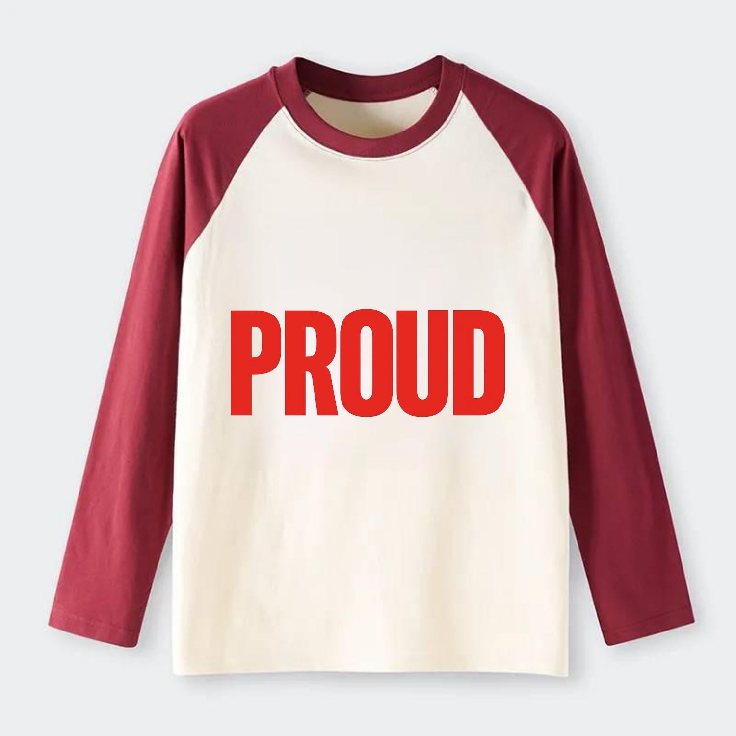 Bold typography design - "PROUD" - satisfied, honored, dignified - Raglan Long Sleeve T-Shirt - Red