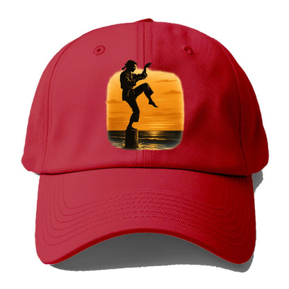 karate crane kick pose on wooden post at beach sunset - Baseball Cap - Red