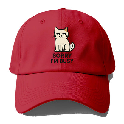 Cat sitting alone looking content - "SORRY I'M BUSY" - not sorry at all - Baseball Cap - Red