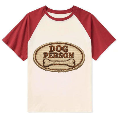 DOG PERSON - simple text with bone in brown , team dog - Contrast Raglan T-shirt - Red