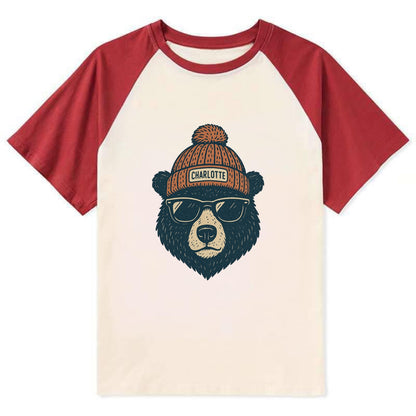 North Carolina Black Bear wearing Charlotte beanie with pom pom and - Contrast Raglan T-shirt - Red