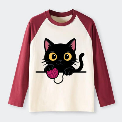 Midnight the black cat tapping the ledge rhythmically with one bright - Raglan Long Sleeve T-Shirt - Red