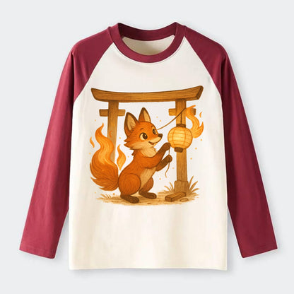 Foxfire kitsune stringing lanterns along a torii gate with tails of - Raglan Long Sleeve T-Shirt - Red