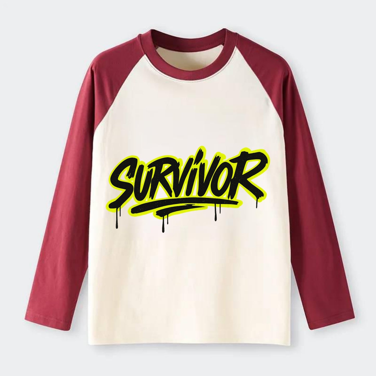 Bold typography design - "SURVIVOR" - overcomer, still standing, made - Raglan Long Sleeve T-Shirt - Red