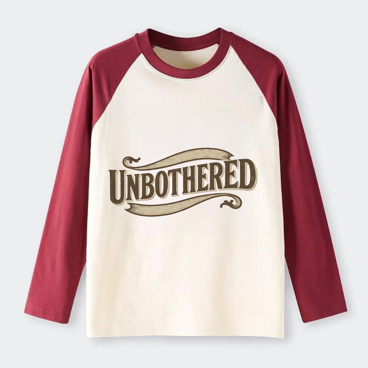Bold typography design - "UNBOTHERED" - not affected, staying calm - Raglan Long Sleeve T-Shirt - Red