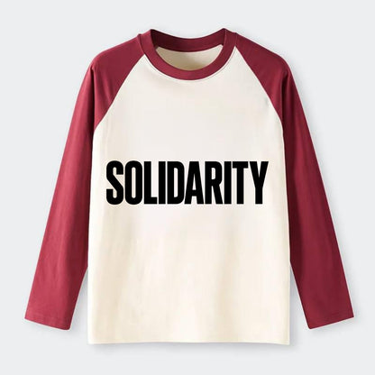 Bold typography design - "SOLIDARITY" - standing together, support - Raglan Long Sleeve T-Shirt - Red