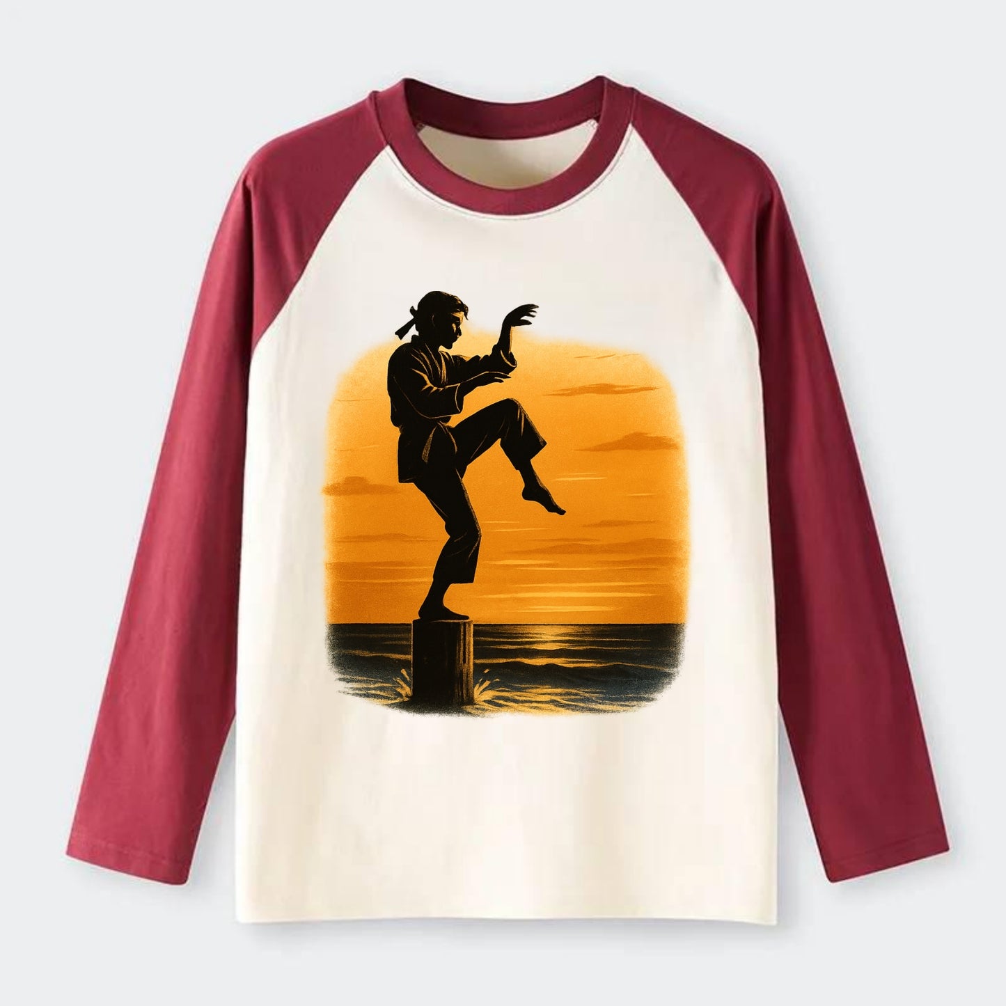 karate crane kick pose on wooden post at beach sunset - Raglan Long Sleeve T-Shirt - Red