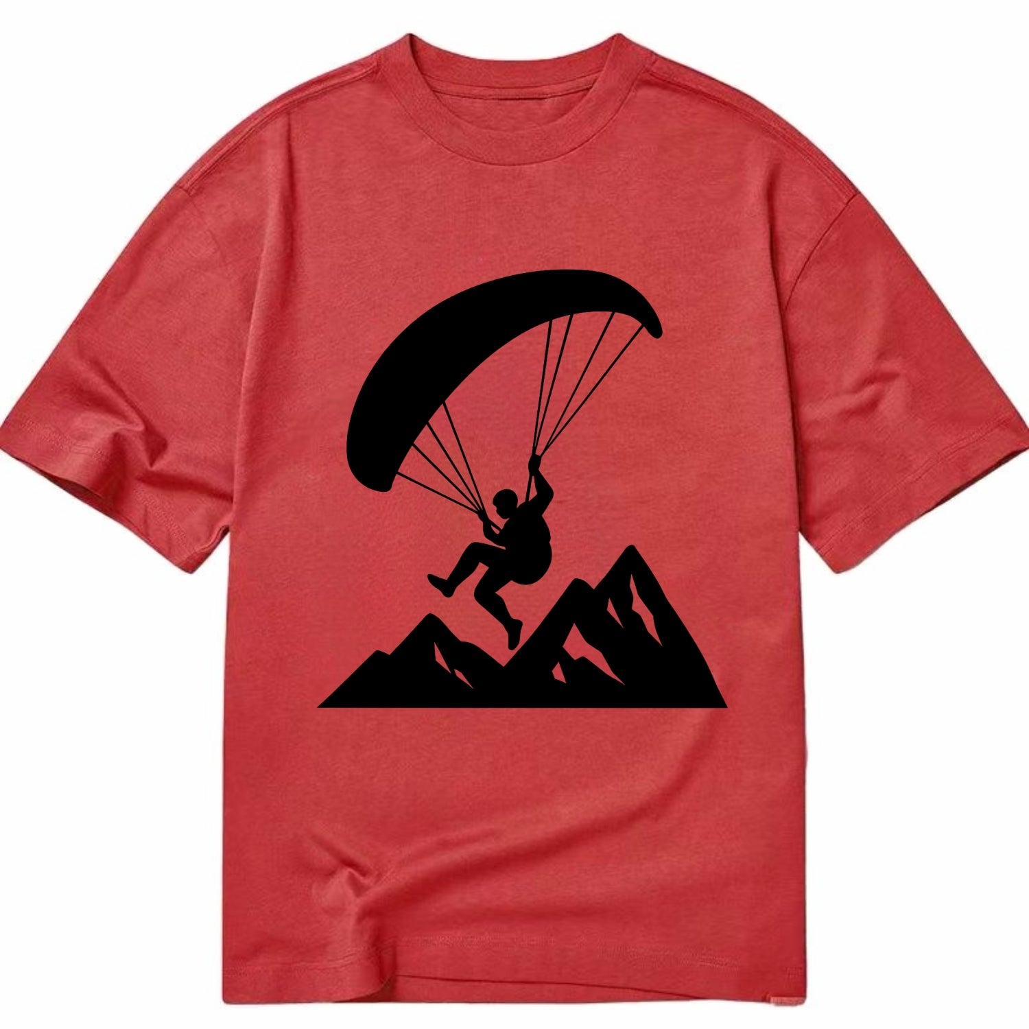 Paraglider soaring over mountain peaks - Classic T-shirt - Red