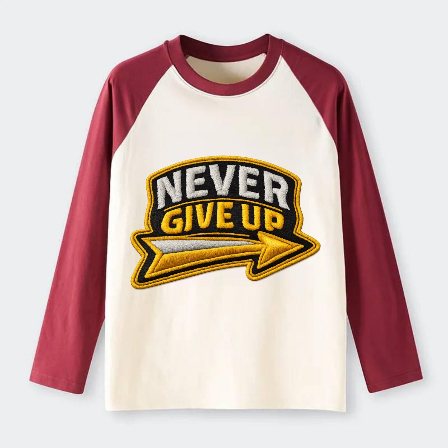 NEVER GIVE UP - bold text with arrow in gold , determination - Raglan Long Sleeve T-Shirt - Red