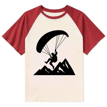 Paraglider soaring over mountain peaks - Contrast Raglan T-shirt - Red
