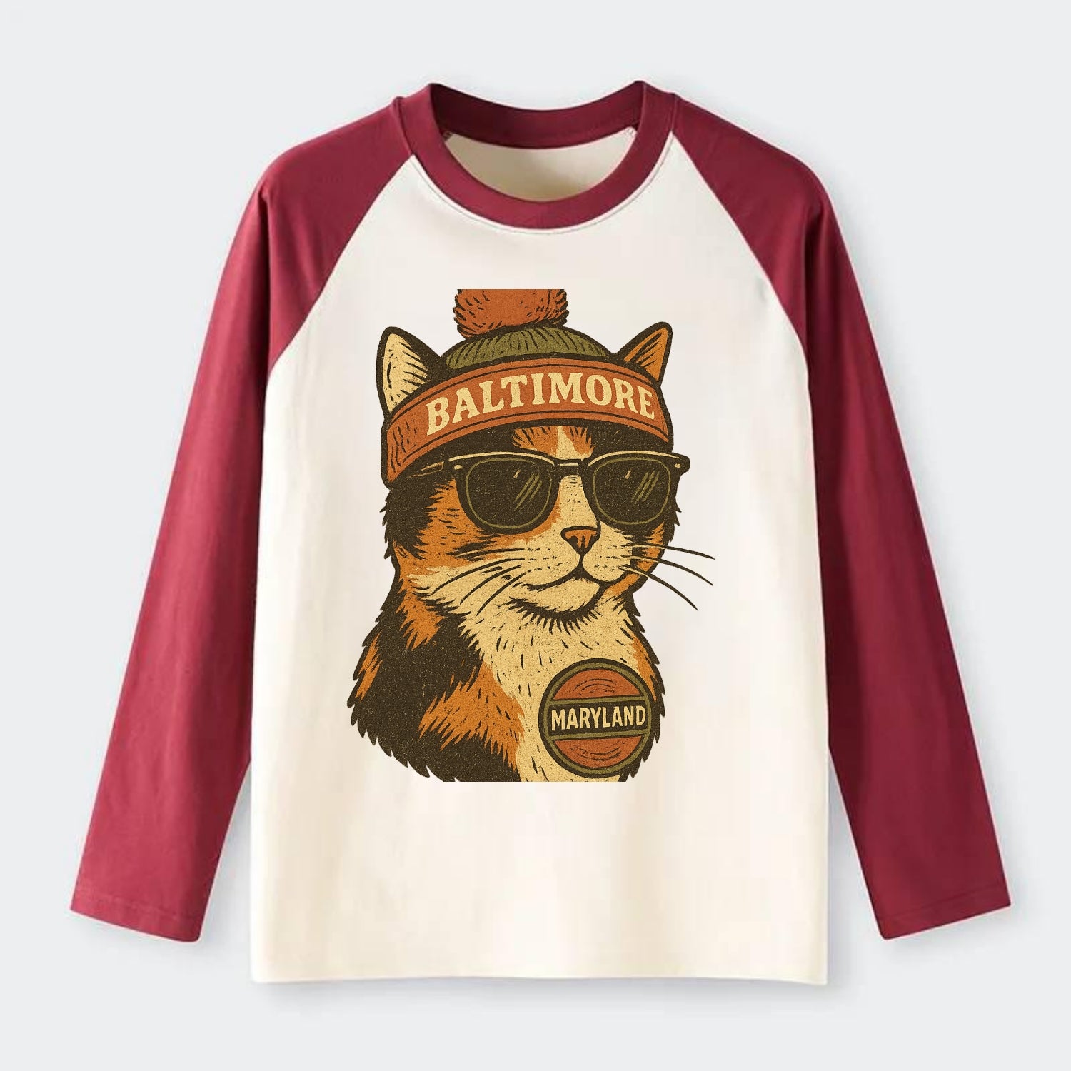 Maryland Calico Cat wearing Baltimore beanie with pom pom and wayfarer - Raglan Long Sleeve T-Shirt - Red