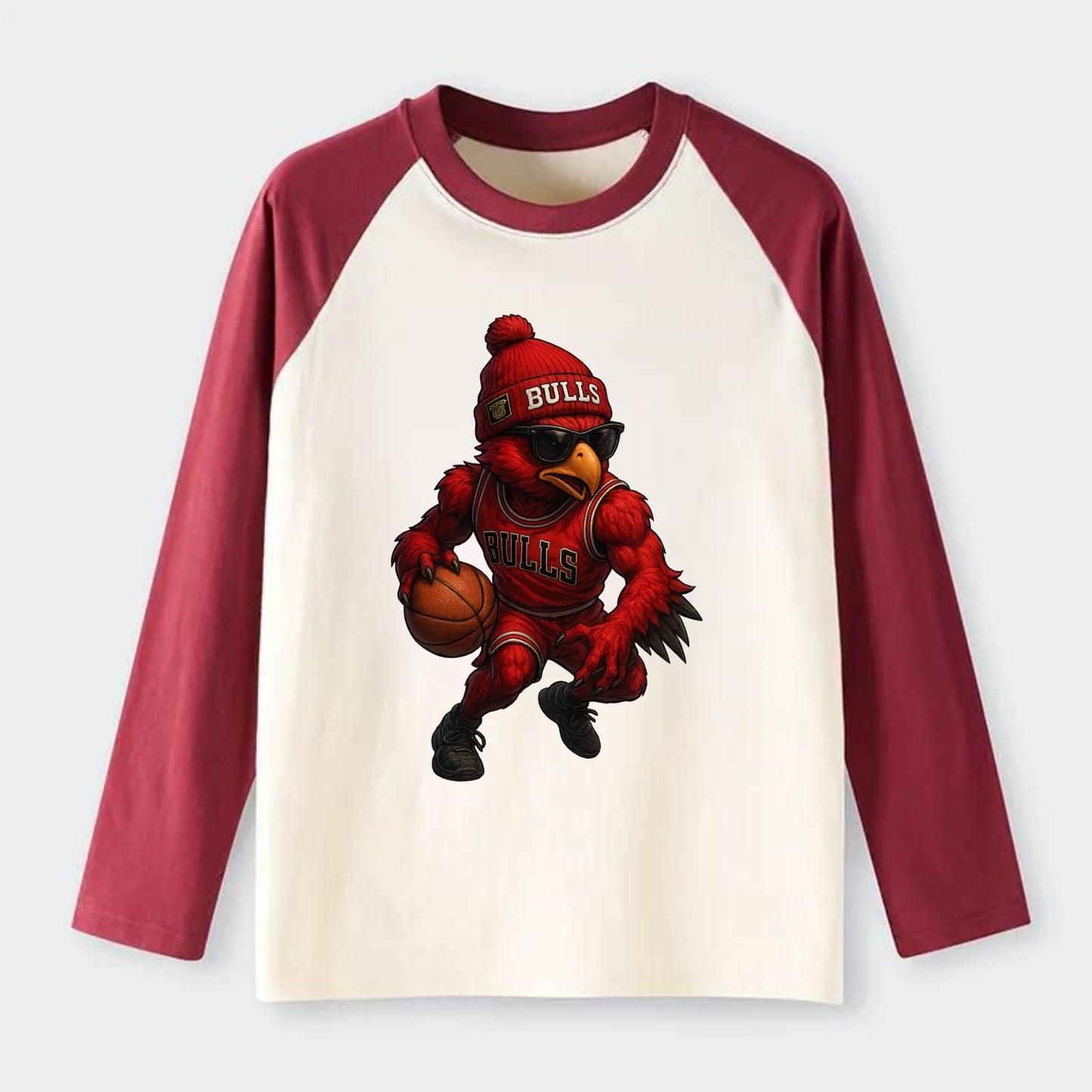 Windy City Hawk wearing Bulls beanie with six rings patch and wayfarer - Raglan Long Sleeve T-Shirt - Red