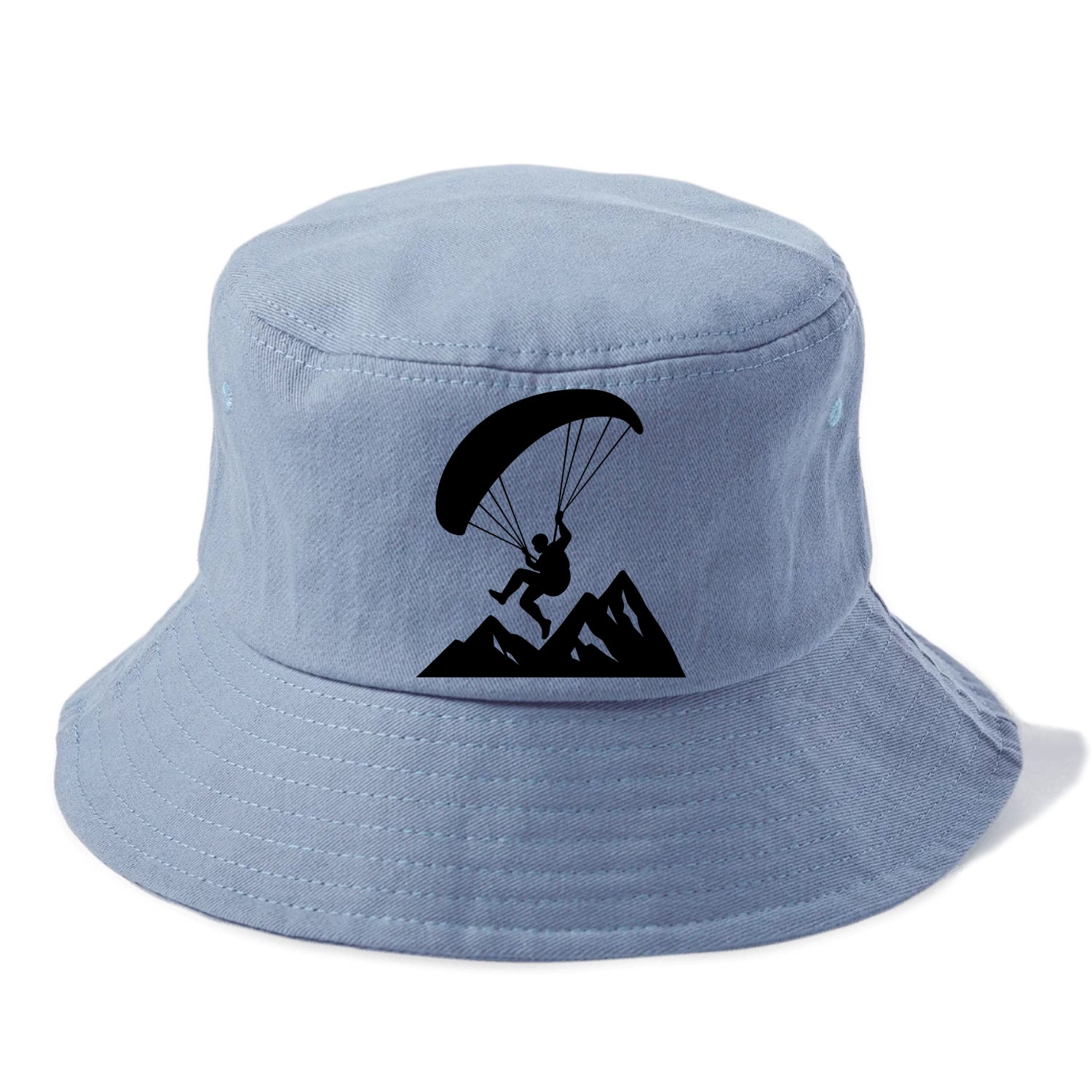 Paraglider soaring over mountain peaks - Bucket Hat - Summer Sky(Blue)