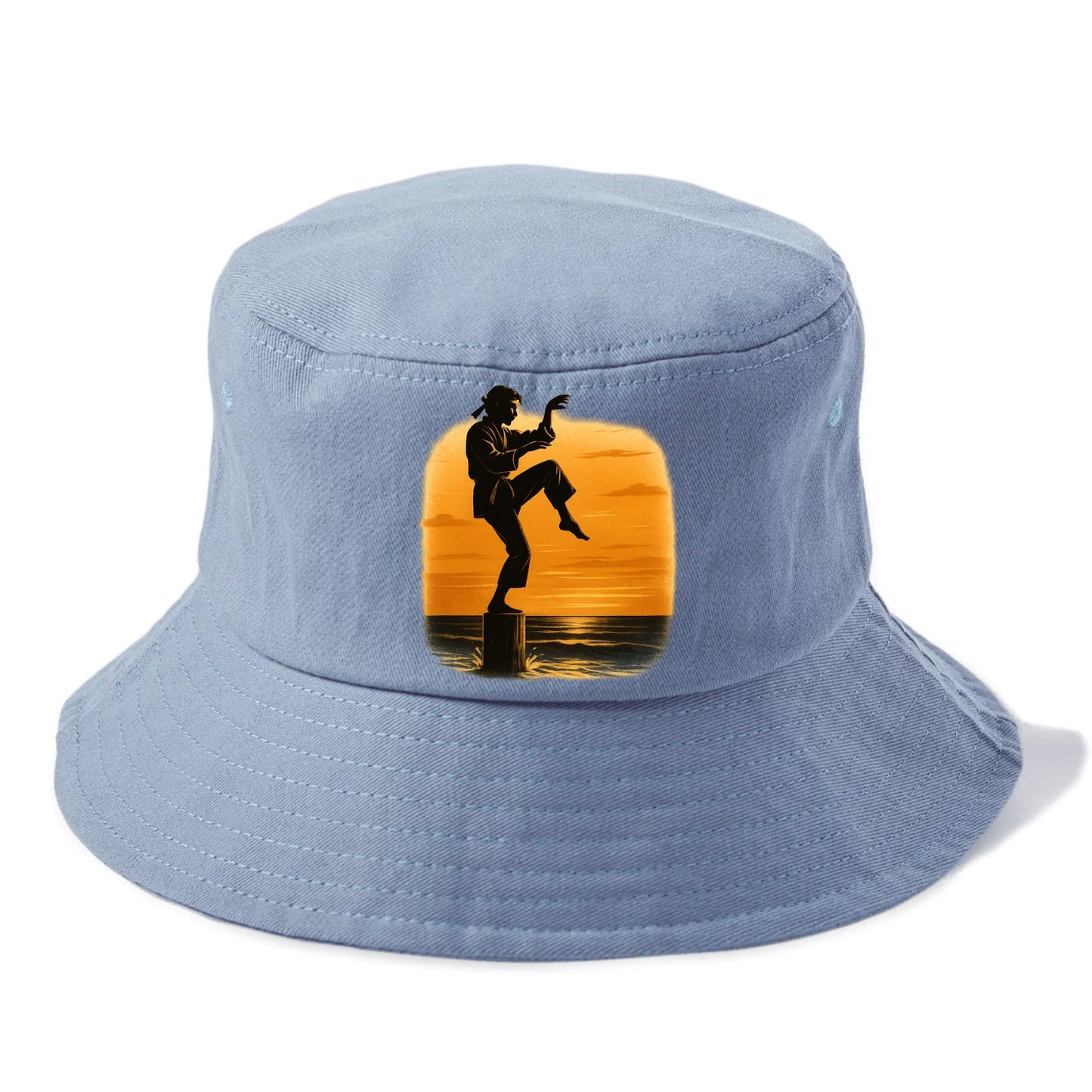 karate crane kick pose on wooden post at beach sunset - Bucket Hat - Summer Sky(Blue)