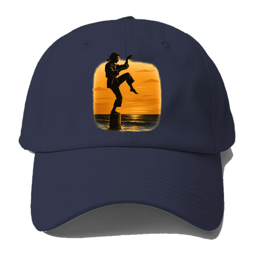 karate crane kick pose on wooden post at beach sunset - Baseball Cap For Big Heads