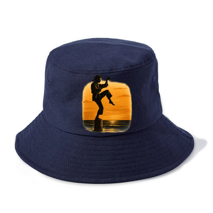 karate crane kick pose on wooden post at beach sunset - Bucket Hat - Twilight Navy(Blue)