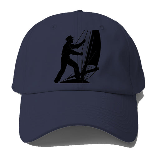 Sailor adjusting the boom on a sailboat - Baseball Cap For Big Heads