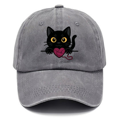 Midnight the black cat stretching tall with claws gently hooked over the edge. - Classic Cap - Urban Haze(Grey)