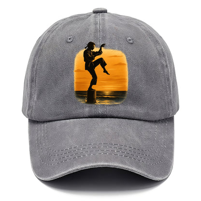 karate crane kick pose on wooden post at beach sunset - Classic Cap - Urban Haze(Grey)