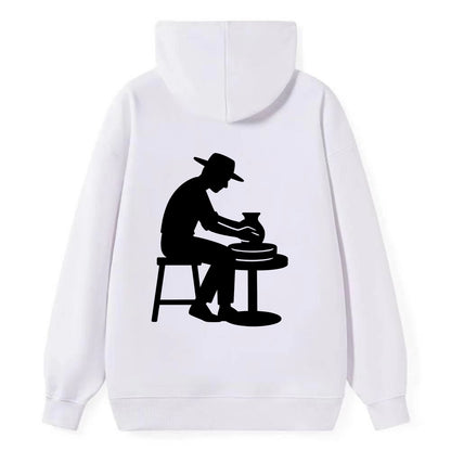 Potter shaping clay on wheel - Classic Pullover Hoodie - White