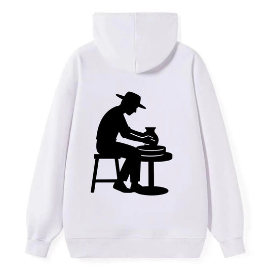 Potter shaping clay on wheel - Classic Pullover Hoodie - White