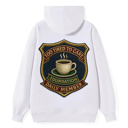 Crest with coffee cup - "Too Tired To Care Foundation - Daily Member" - - Classic Pullover Hoodie - White