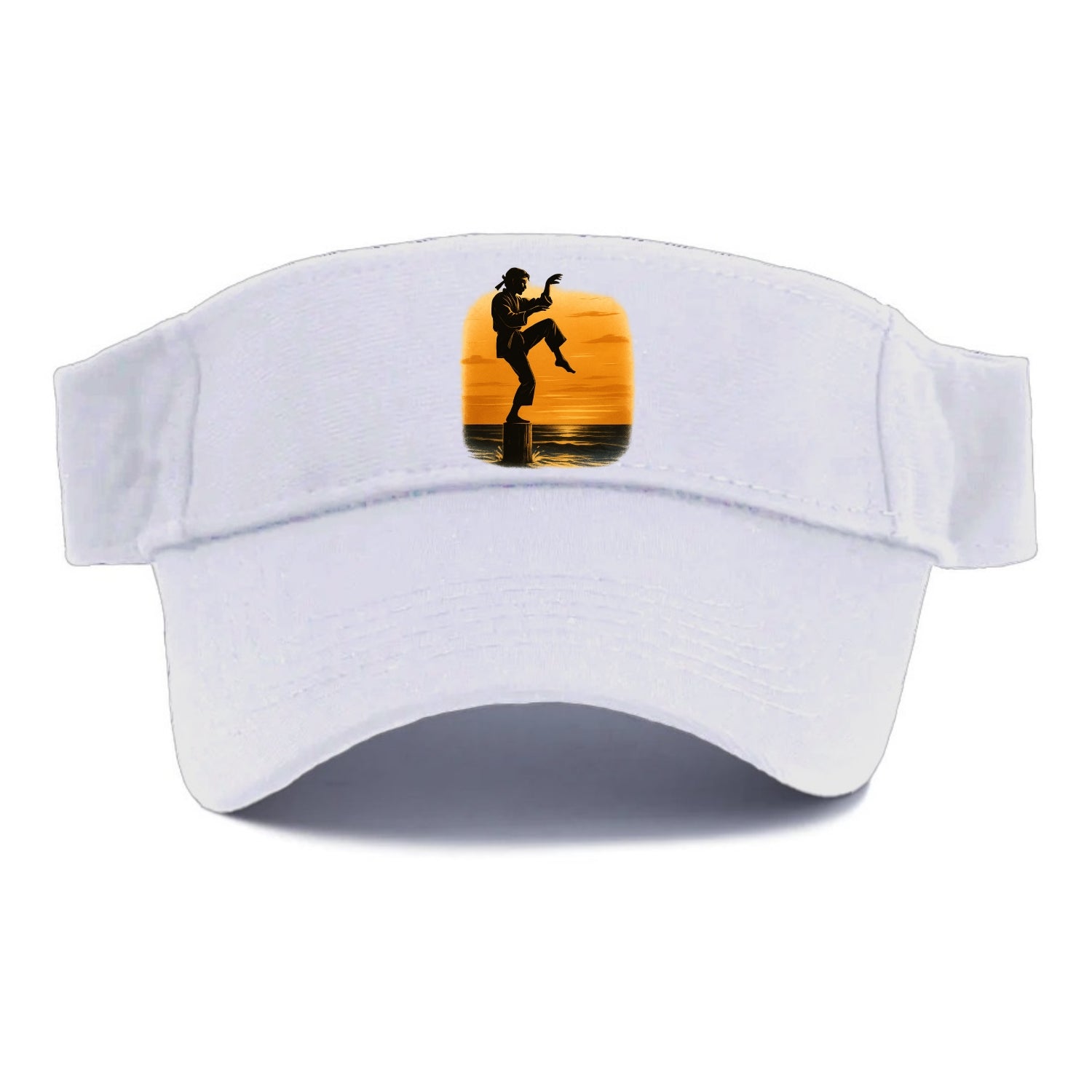 karate crane kick pose on wooden post at beach sunset - Visor - White