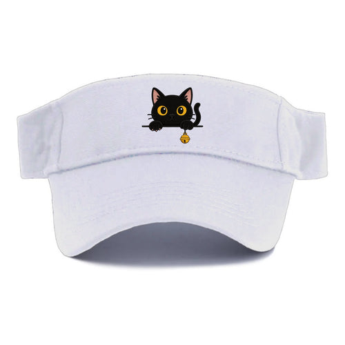 Midnight the black cat leaning sideways with chin resting on left paw. - Visor